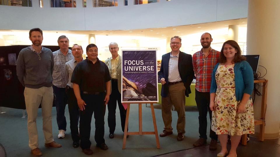 A photo of Anne along with other contributors to a 2016 exhibit called Focus on the Universe: Astrophotographers of Southern California. Anne is an amateur astrophotographer and one of her Milky Way photos was included in the exhibit!