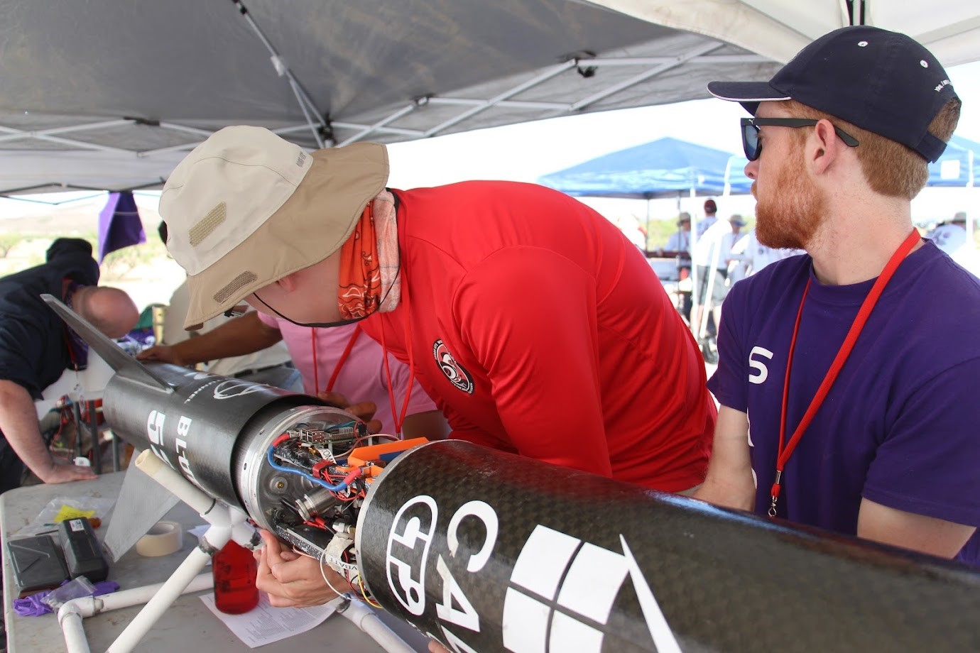 Image of James assembling a rocket