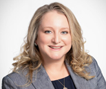 Headshot of Rebecca Adler Miserendino against white background