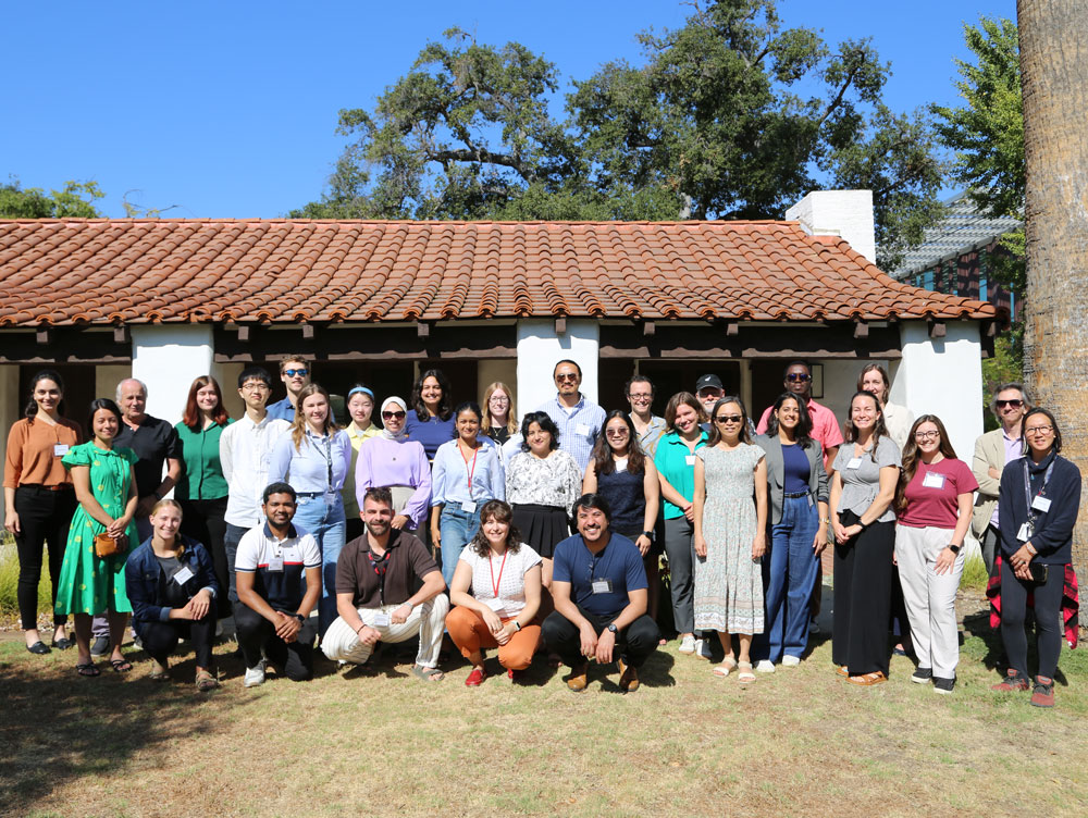 group standing in front of a house