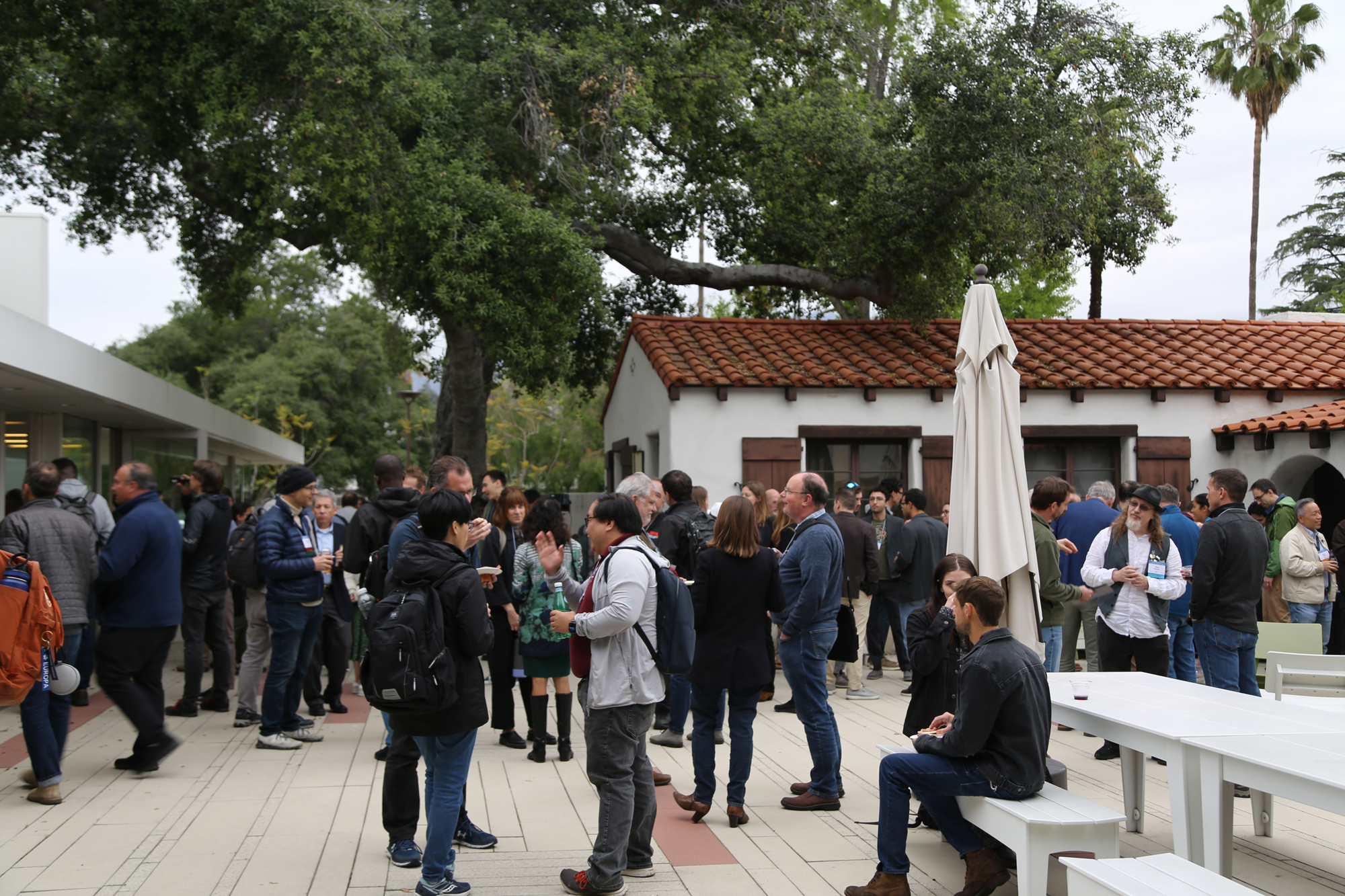 courtyard filled with people networking with one another
