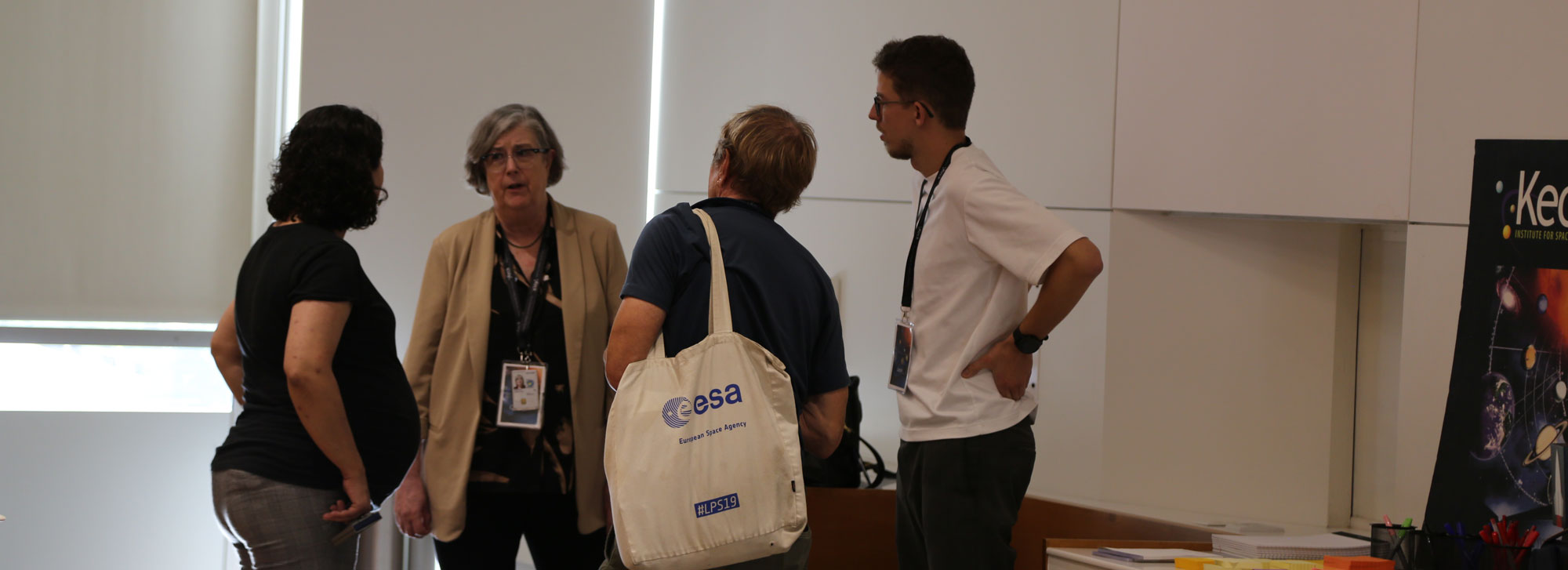 four participants discussing