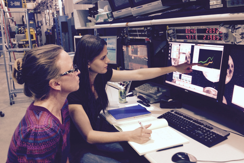 Description: Jennifer Jackson and graduate student Natalia Solomatova conducting measurements of candidate Venus analogues, at the Advanced Photon Source