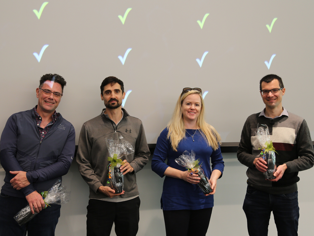 four presenters for short course holding thank you gift